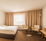 Bedroom 6 Cosmopolitan Bobycentrum – Czech Leading Hotels