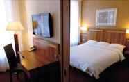 Bedroom 2 Hotel The Originals du Grand Monarque