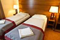 Bedroom Ivbergs Hotel Berlin Messe
