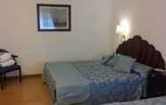 Kamar Tidur 4 Hotel Clelia Logis