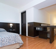 ห้องนอน 5 Urquiza Apart Hotel & Suites