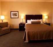 Bedroom 4 Legacy Inn & Suites