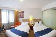 ห้องนอน Holiday Inn Express Tianjin Dongli, an IHG Hotel