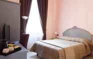 Kamar Tidur 2 Leone X Guest House