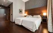 Kamar Tidur 3 Hotel Barcelona Colonial