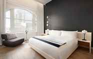 Kamar Tidur 3 The Ames Boston Hotel, Curio Collection by Hilton