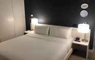 Kamar Tidur 5 The Ames Boston Hotel, Curio Collection by Hilton