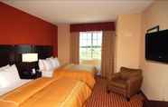 Bedroom 6 Hometown Executive Suites