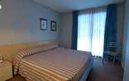 Kamar Tidur 5 Hotel Residence Universo