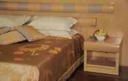Kamar Tidur 4 Il Boscareto Resort & Spa