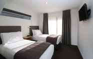 Bedroom 3 Dunedin Motel and Villas