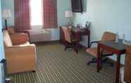 Bedroom 6 Days Inn & Suites by Wyndham Columbus NE