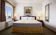 Bedroom 3 Days Inn & Suites by Wyndham Columbus NE