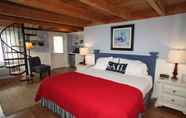 Kamar Tidur 4 Glen Cove Inn & Suites