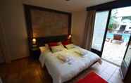 Bedroom 2 Tropical Hotel