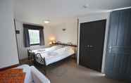Bedroom 3 Tropical Hotel