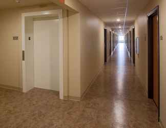 Lobby 2 WoodSpring Suites Council Bluffs, an Extended Stay Hotel