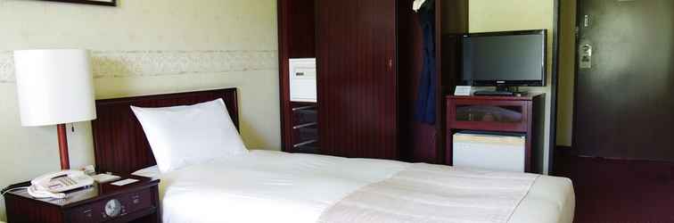 Kamar Tidur Manza Prince Hotel