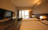 Bedroom 6 Yiwu Commatel hotel