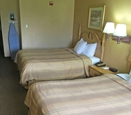 Bedroom 4 Americas Best Value Inn & Suites Kilgore