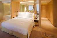 Kamar Tidur Million Dragon Hotel