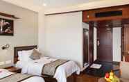 Bedroom 2 Keys Select by Lemon Tree Hotels, Malabar Gate, Kozhikode