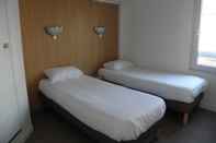 ห้องนอน Fasthôtel Clermont Ferrand Hôtel