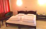ห้องนอน 4 Alpana Hotel