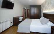Phòng ngủ 5 Hotel Oca Insua