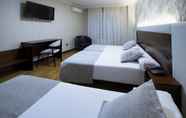 Phòng ngủ 6 Hotel Oca Insua