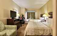 Kamar Tidur 7 Magnolia Inn & Suites