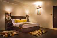 Bedroom Jain Group Royal Orchid & Spa