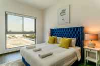Phòng ngủ One Perfect Stay - Al Furjan