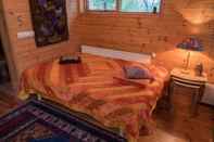 ห้องนอน Beautiful Cozy Cottage