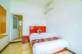 Kamar Tidur 4 Yijie Holiday Hotel Water GreatWall No.1