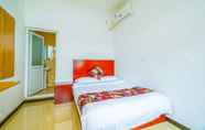 Kamar Tidur 3 Yijie Holiday Hotel Water GreatWall No.1