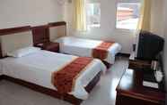 Kamar Tidur 4 Yijie Holiday Hotel Miyun Longxi