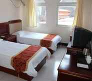 Kamar Tidur 4 Yijie Holiday Hotel Miyun Longxi