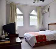 Kamar Tidur 5 Yijie Holiday Hotel Miyun Longxi