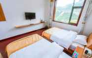 Kamar Tidur 4 Yijie Holiday Hotel  Laiyuan Baishishan