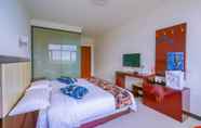 Bedroom 7 Yijie Holiday Hotel  Zhangbei Prairie
