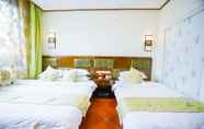 Kamar Tidur 6 Yijie Holiday Hotel Taierzhuang Old Town