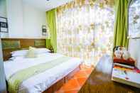 Bilik Tidur Yijie Holiday Hotel Taierzhuang Old Town