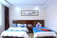 ห้องนอน Yiyun Botique Inn Wutaishan Qingju