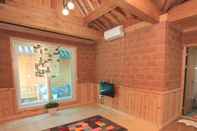 Common Space Sanasa Red Clay House