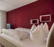 ห้องนอน 6 Hotel des Alpes