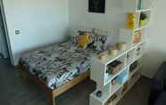 Kamar Tidur 5 Sunny Apartments 1BDR