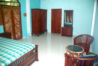 Kamar Tidur 4 King Coconut Lodge