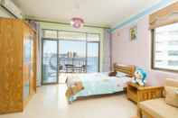 Kamar Tidur Sanya Ninety Steps Seaview Apartment