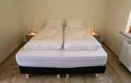 Kamar Tidur 4 Guesthouse Hvitafell